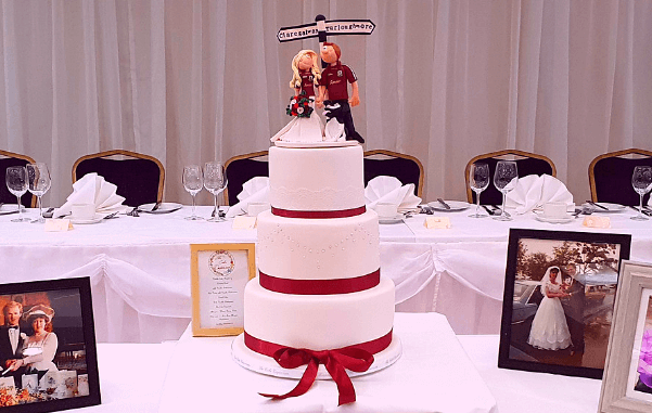 wedding cakes galway showing couple in GAA colours